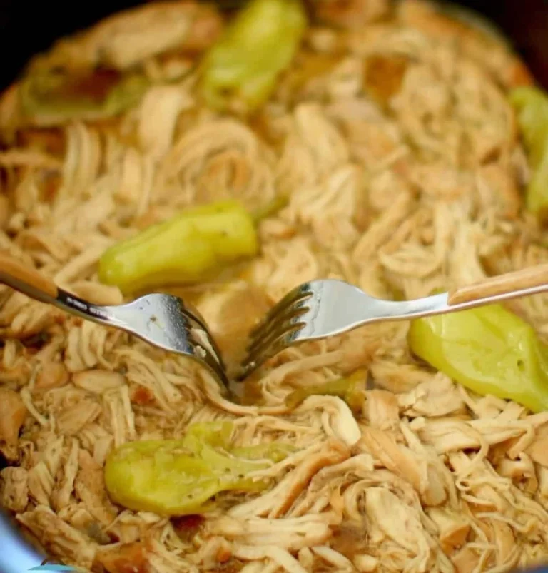 Delicious Easy Mississippi Chicken Crockpot Recipe with tender chicken and spices