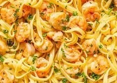 Delicious garlic butter shrimp pasta topped with parsley and served in a bowl
