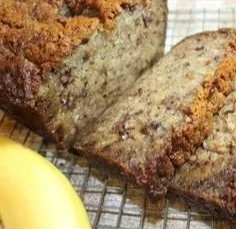 Delicious slices of moist banana bread on a wooden table