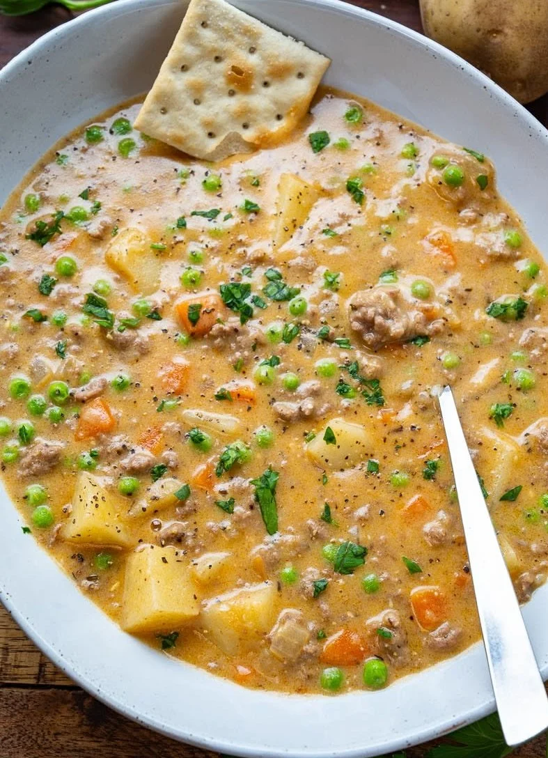 Delicious bowl of Shepherd's Pie Soup topped with fresh herbs and spices