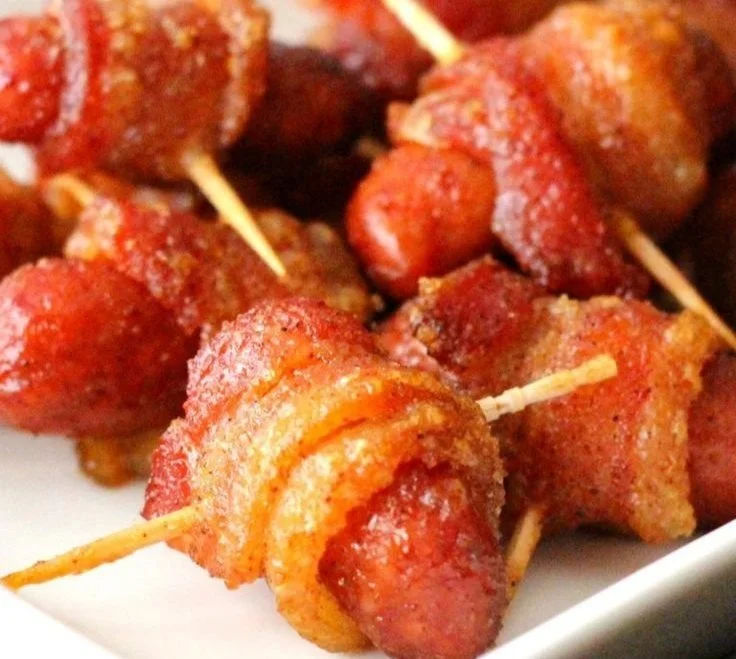 Plate of brown sugar bacon-wrapped smokies ready to be served.