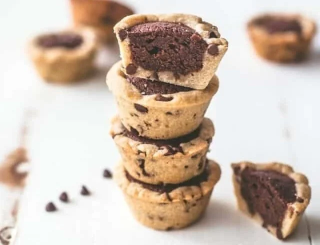 Delicious brownie tarts served on a platter, perfect for dessert lovers.