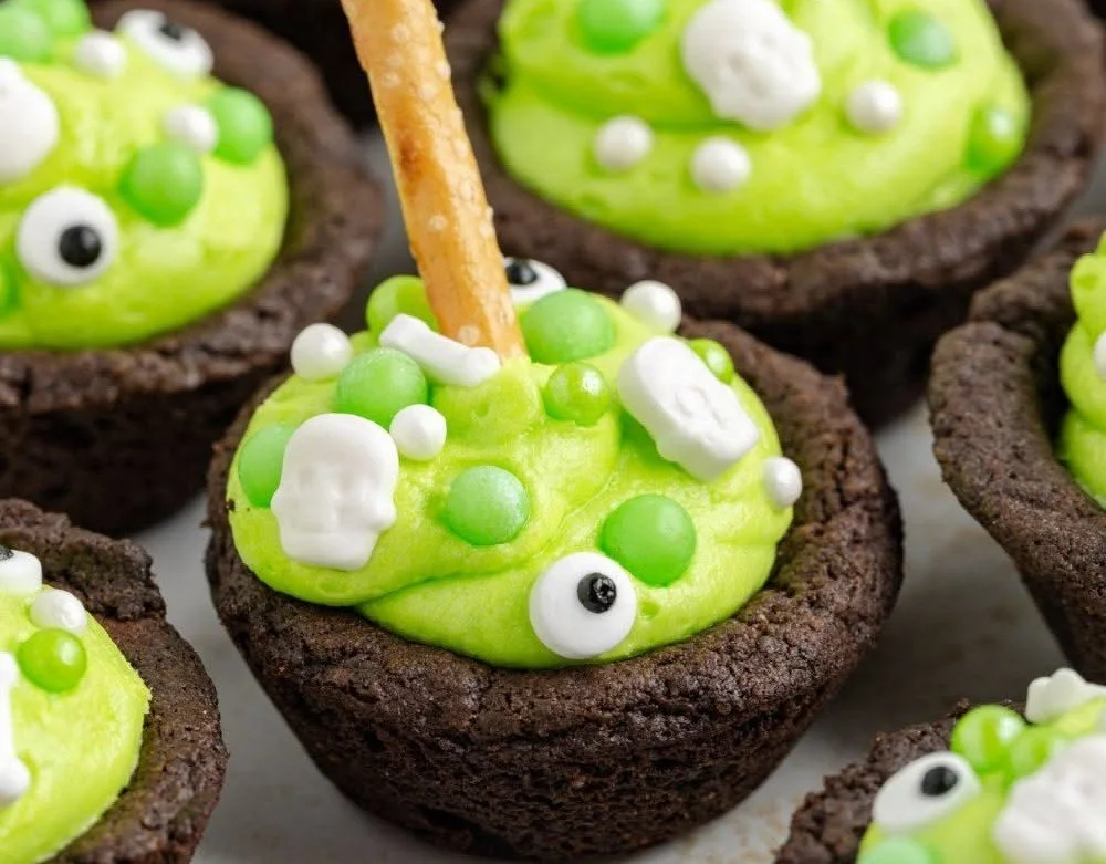Delicious homemade Cauldron Cookies made with chocolate cake mix and festive toppings.