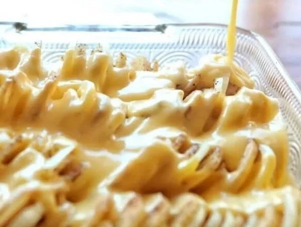 Delicious cheesy scalloped potatoes baked to perfection