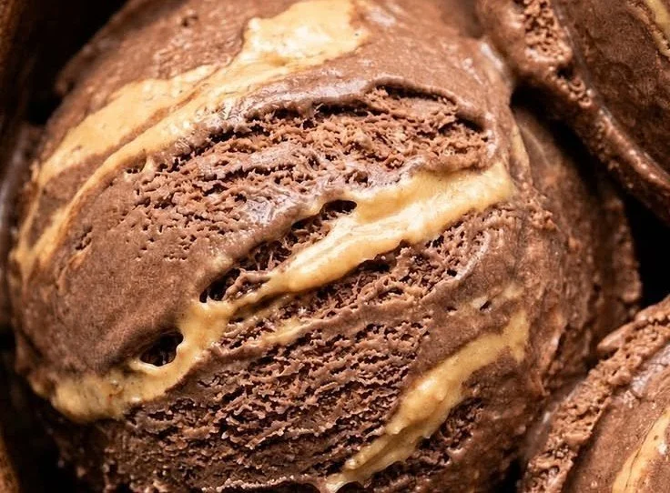 Chocolate peanut butter cottage cheese frozen dessert served in a bowl