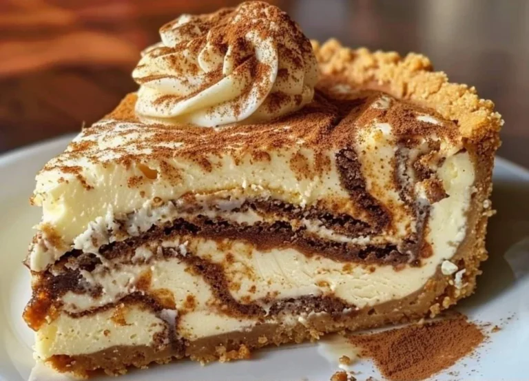 Delicious homemade cheesecake slice with a graham cracker crust.