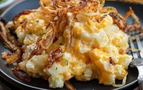 Delicious French Onion Funeral Potatoes served in a baking dish