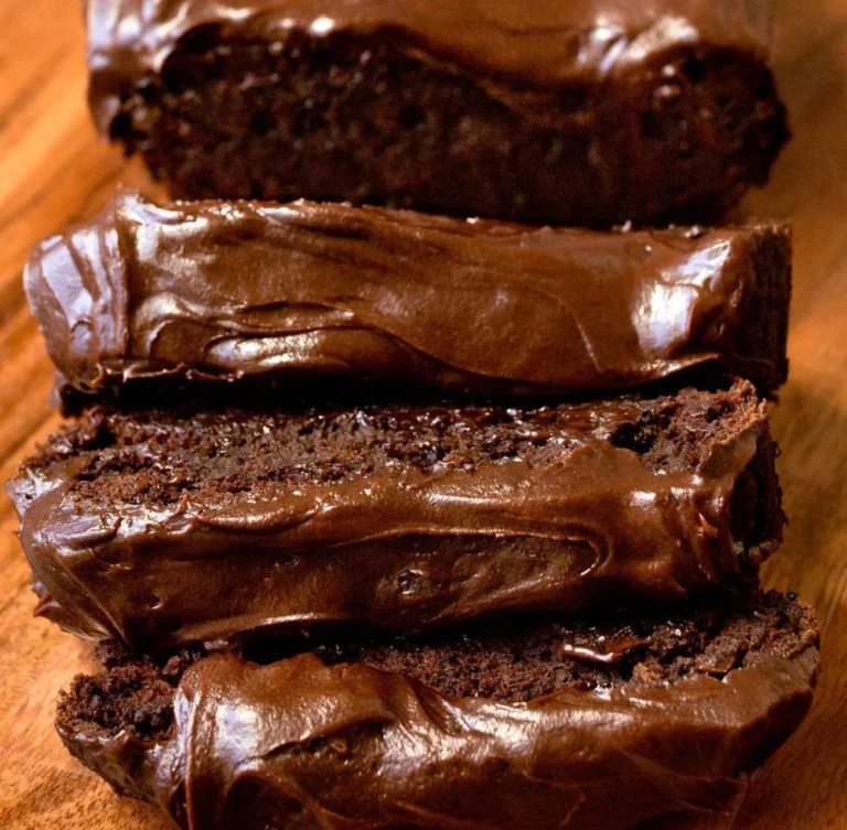 Frosted Dark Chocolate Pumpkin Bread with chocolate drizzle