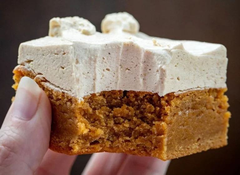 Gingerbread ermine dessert with festive decorations for winter celebrations.