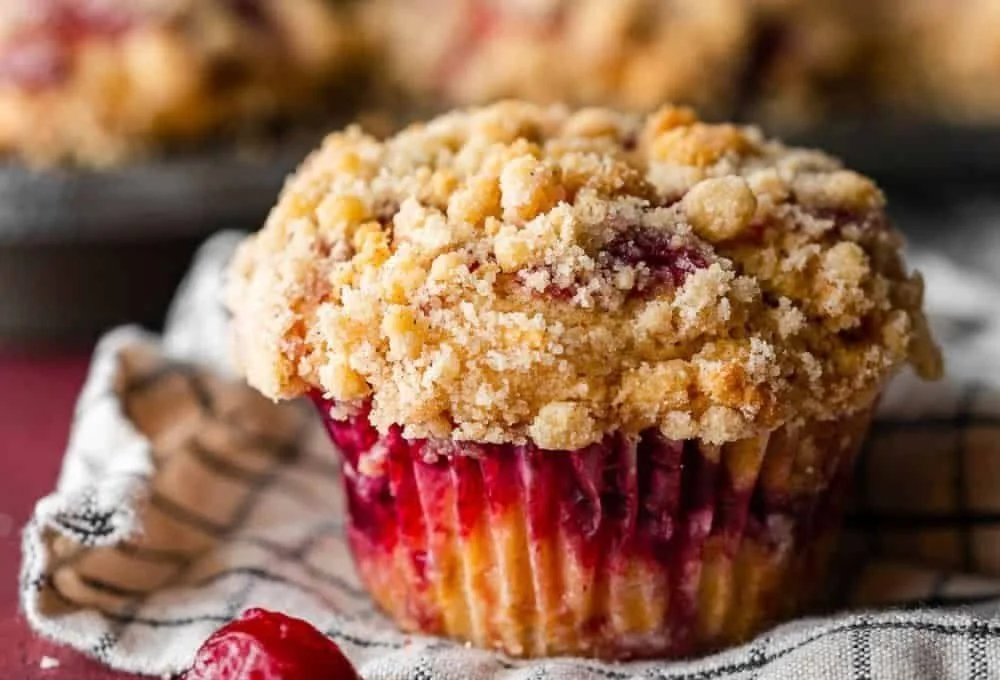 Delicious leftover cranberry sauce coffee cake muffins on a plate