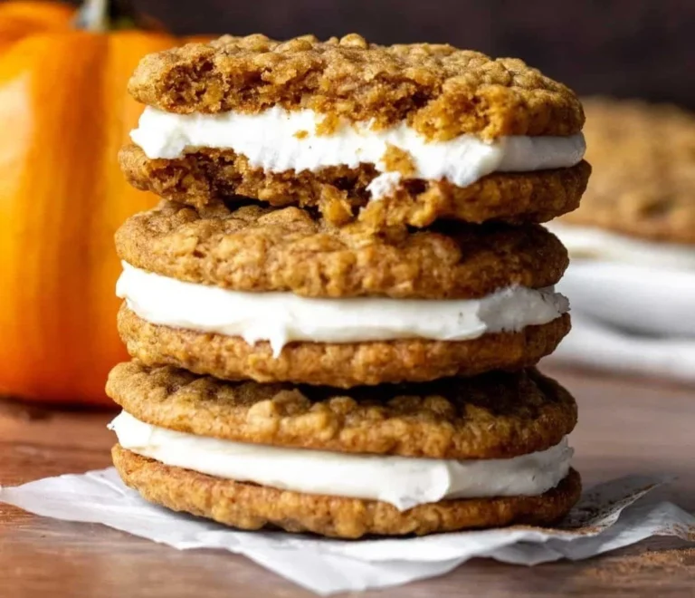 Homemade Pumpkin Oatmeal Cream Pies on a wooden table