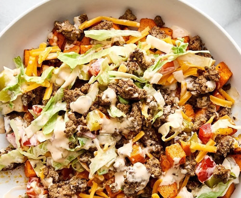 Sweet Potato and Ground Beef Burger Bowl served in a vibrant dish