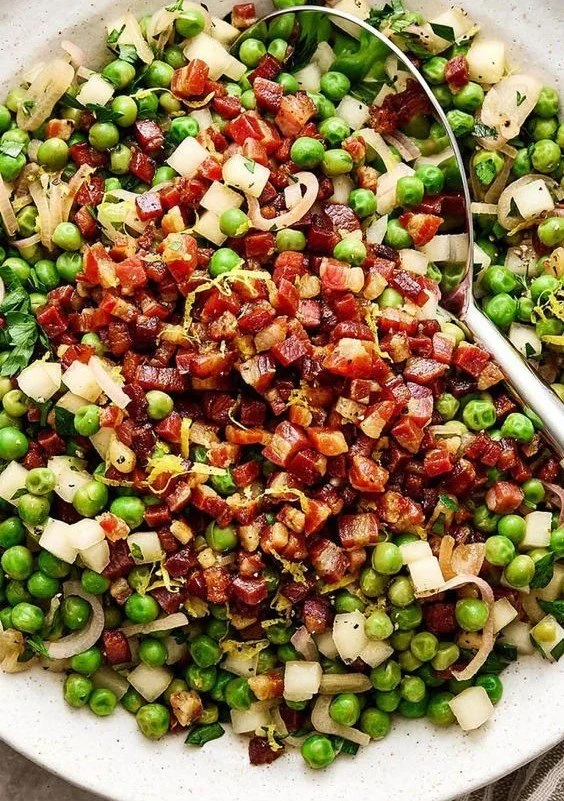 Delicious Thanksgiving peas side dish recipe served on a festive table.